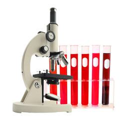 Laboratory metal microscope and test tubes with liquid isolated on white
