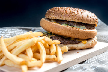 Cheese burger - American cheese burger with Golden French fries
