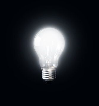 Glowing light bulb in dark.creativity inspiration concept