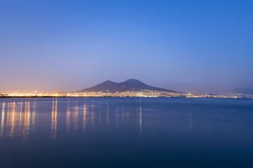 Fototapeten An amazing  evening in Naples, Tyrrhenian Sea and Mount Vesuvius over city © Savvapanf Photo ©