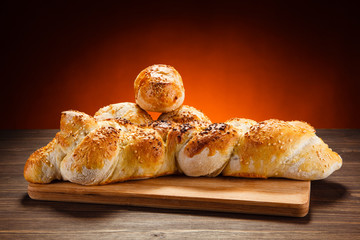 Pastry - crispy buns on wooden table