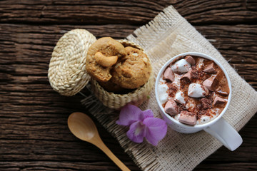 Hot cocoa Marshmallow cookies on dark wood background with copy space