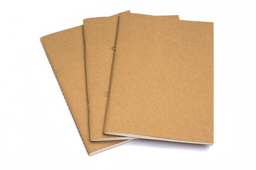 Brown notebooks isolated on white background.