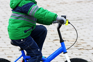 The child and the Bicycle.