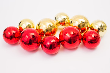 Red and gold Christmas ball on white background