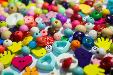 Beads Background. Retro Top View Colorful Bead Heap. child background.