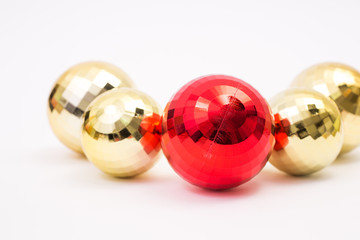 Red and gold Christmas ball on white background