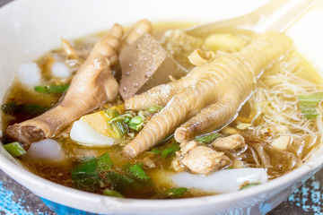 Asian delicatessen - chicken foot in noodle soup