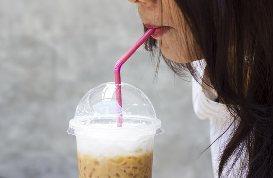 Woman Drinking Iced Coffee, Close-up