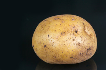 potatoes on a black