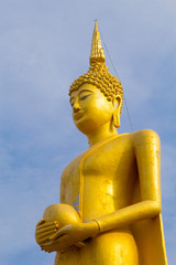 Big buddha statue over scenic blue sky background at Wat Klong reua. Phitsanulok, Thailand.