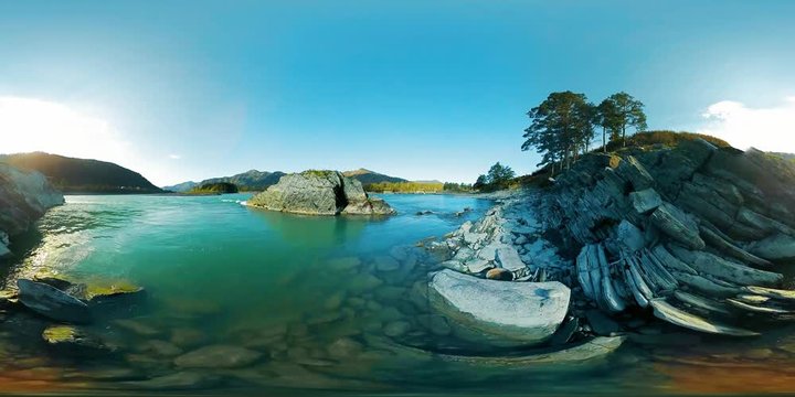 UHD 4K 360 VR Virtual Reality of a clear fast river flows over rocks in beautiful mountain landscape in the Altai mountains forest in autumn or summer day