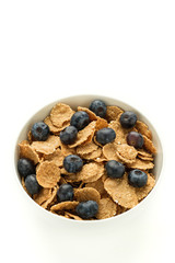 Healthy food. Multi grain flakes with blueberry and for breakfast. Close-up.