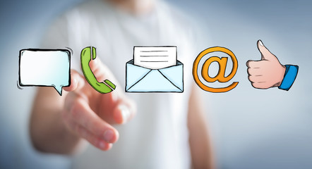 Businessman touching manuscript contact icon with his finger