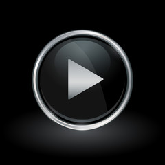 Multimedia symbol with play arrow icon inside round chrome silver and black button emblem on black background. Vector illustration.