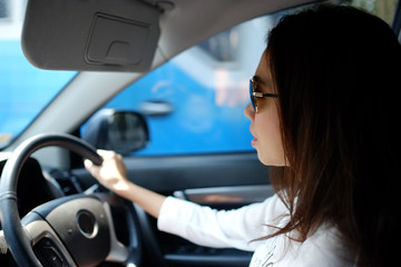 Fototapeta na wymiar Woman driving car 