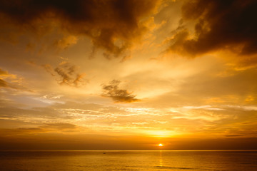 Beautiful sea sunset with deep cloudy sky