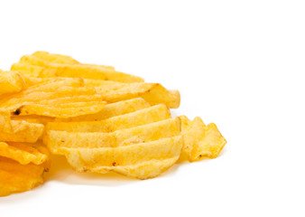 yellow potato chips isolated on white