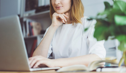 Woman working at her office with technology achievement research strategy concept, Self employed woman working on a new project from home.