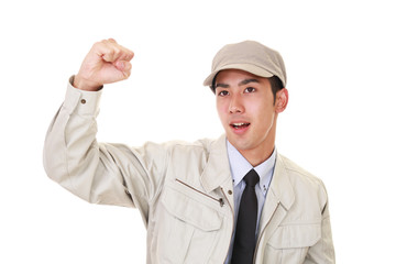 ガッツポーズの作業員
