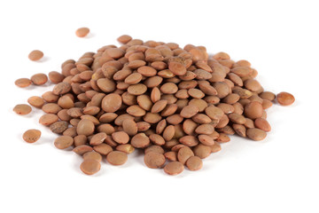 Pile of lentils isolated on white background
