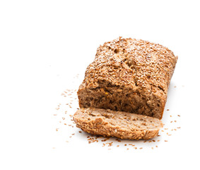 Homemade  wholemeal rye bread with flax seeds isolated on white