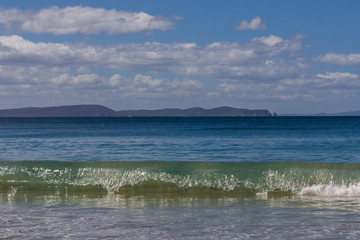 Adventure Bay beach Bruny Island with Cape Raoul in background