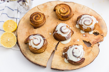 Freshly Cinnabon on wooden disk