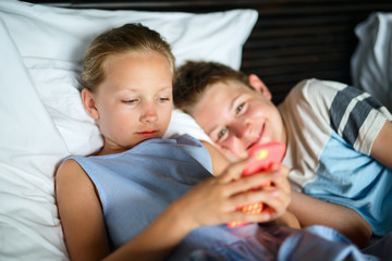 Kids playing on smartphone