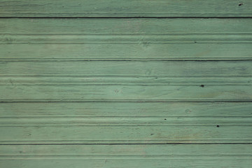 Green wooden background