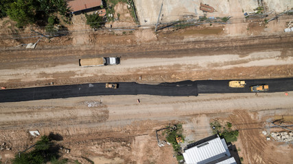 aerial view aboveroad construction worker view from drone .