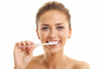 Adult woman with toothbrush isolated on white