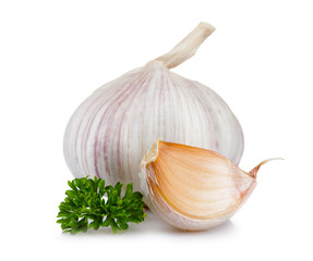 Garlic and parsley leaves isolated on white