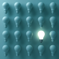 One glowing light bulb standing out from the unlit incandescent bulbs on green background with reflection , individuality and different creative business bright idea concepts . 3D rendering.