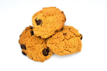 Three peanut butter chocolate chip cookies isolated