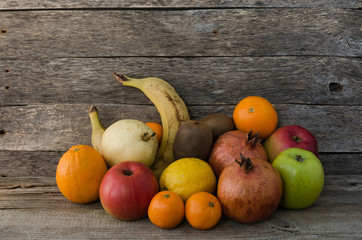 Fruits on wooden background