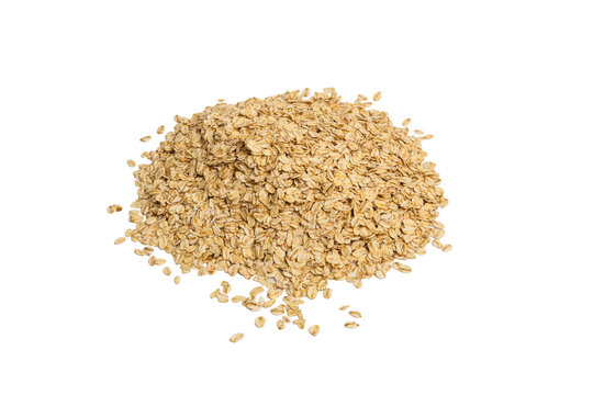 Uncooked oat flakes on white background