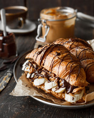 Croissant with banana, peanut butter and chocolate