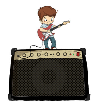 Tocando la guitarra electrica con amplificador. Ni&ntilde;o tocando la guitarra