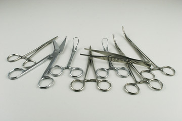 Surgical Instruments on grey background.