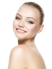 Obraz premium Beautiful face of smiling woman with clean fresh skin