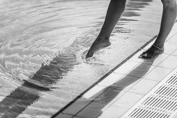 Female swimmer on poolside
