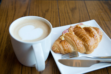 Breakfast with bread and coffee.