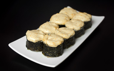 Baked rolls on a white plate