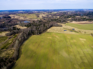 Naklejka premium drone image. aerial view of rural area with freshly green fields