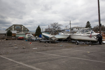 NEW YORK - November 1: Crashed cars after Hurricane Sandy on October 30, 2012 in the Far Rockaway area  on October 30, 2012 in New York City, NY