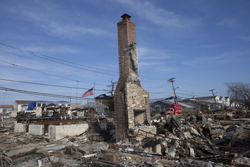 NEW YORK -November12: The fire destroyed around 100 houses during Hurricane Sandy in the flooded...