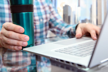 business man  working analyzing financial figures using laptop in the office