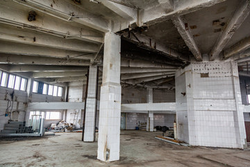 Inside an abandoned deserted cluttered industrial building