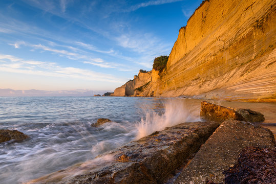 Logas the Sunset Beach and amazing rocky cliff in Peroulades. Corfu Island. Greece.